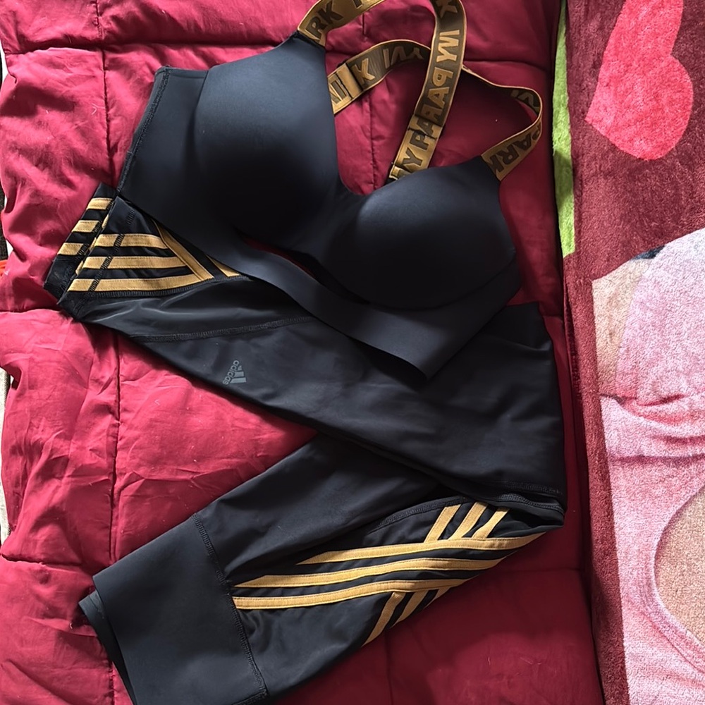 EUC IVY PARK Black and Gold Sports Bra and Legging Set with Mesh Accents